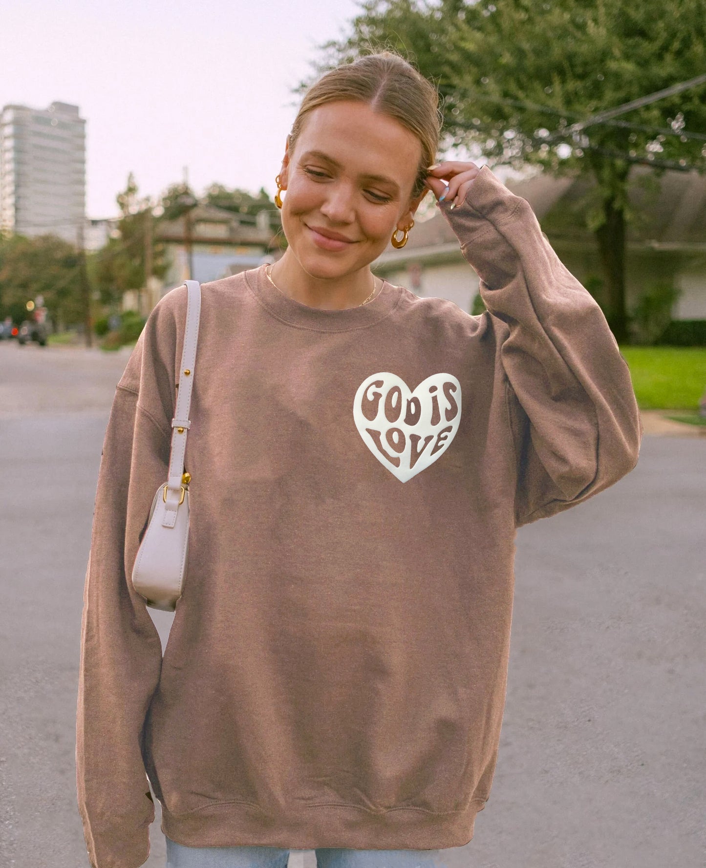 PUFFY GOD IS LOVE UNISEX SWEATSHIRT