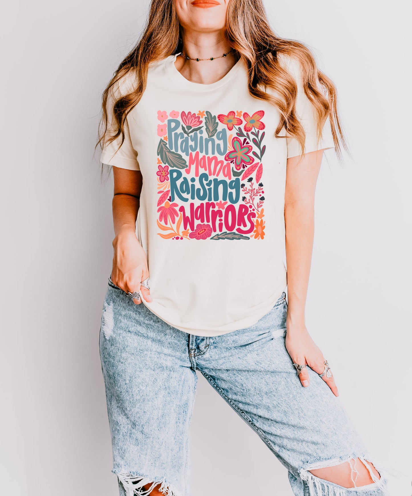 PRAYING MAMA RAISING WARRIORS UNISEX TEE