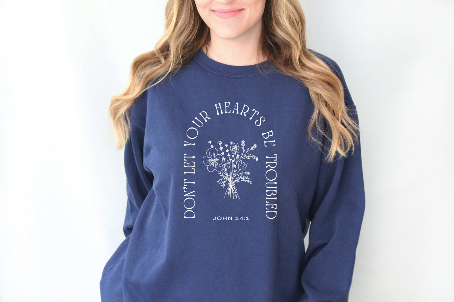 DON'T LET YOUR HEARTS BE TROUBLED UNISEX SWEATSHIRT