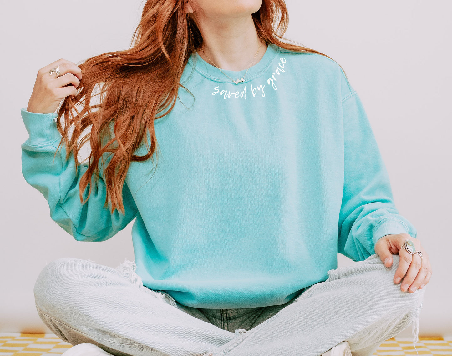 SAVED BY GRACE AROUND THE NECK UNISEX SWEATSHIRT