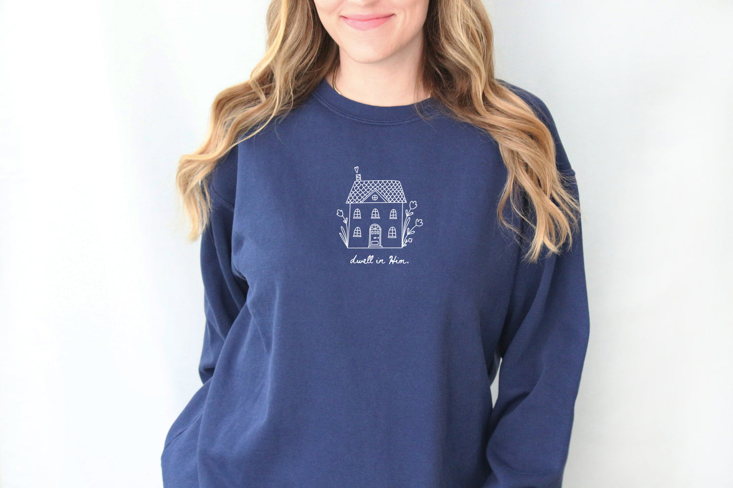 DWELL IN HIM UNISEX SWEATSHIRT