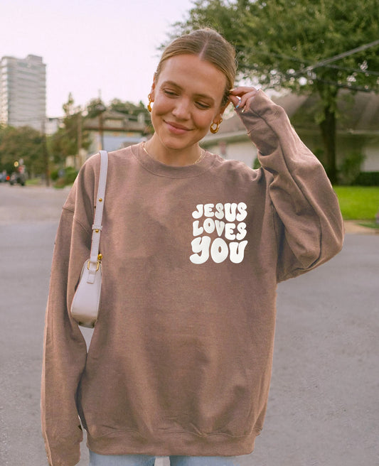 PUFFY JESUS LOVES YOU UNISEX SWEATSHIRT
