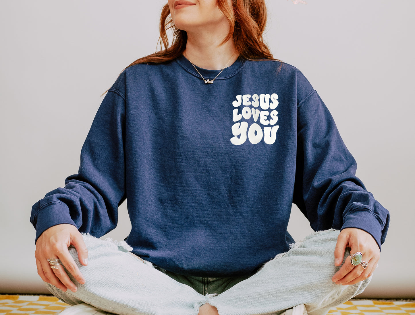 PUFFY JESUS LOVES YOU UNISEX SWEATSHIRT