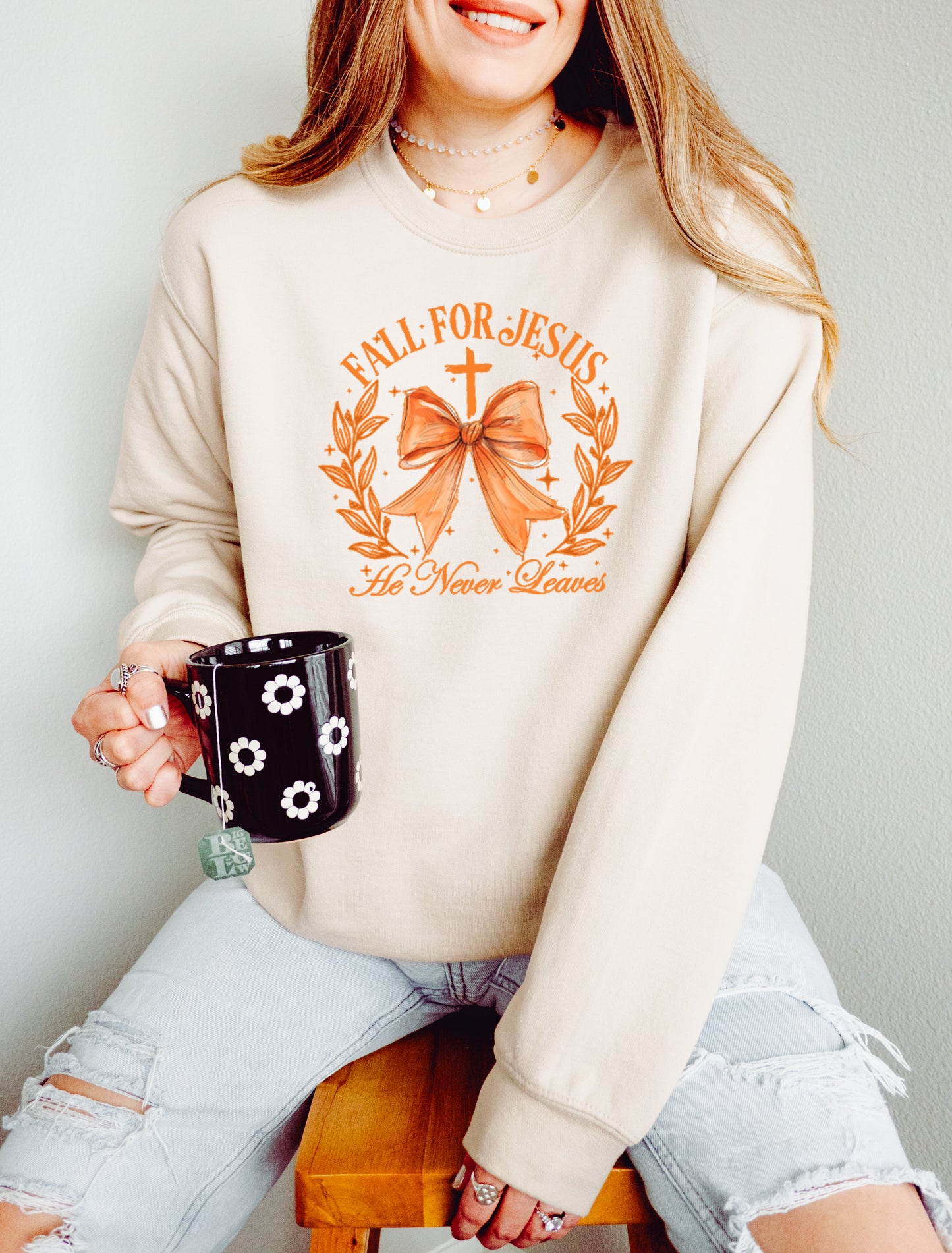 FALL FOR JESUS, HE NEVER LEAVES UNISEX SWEATSHIRT