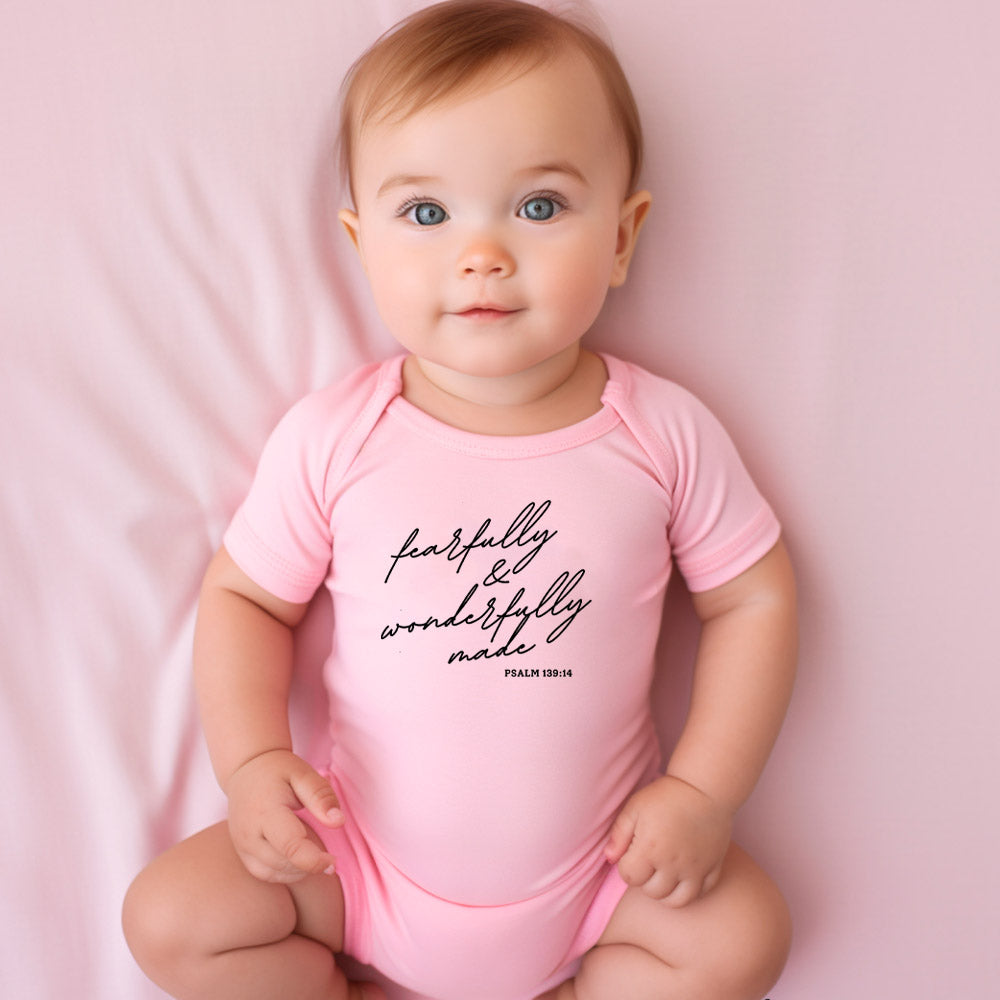 "FEARFULLY AND WONDERFULLY MADE" BODYSUIT IN PINK