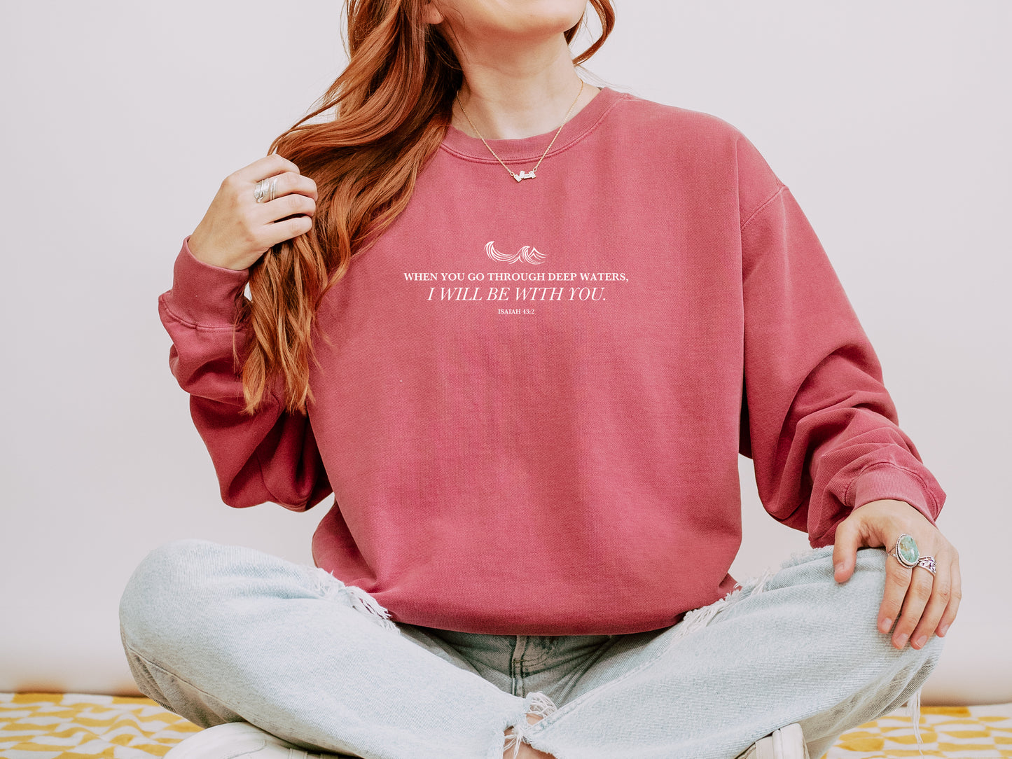 WHEN YOU GO THROUGH DEEP WATERS UNISEX SWEATSHIRT