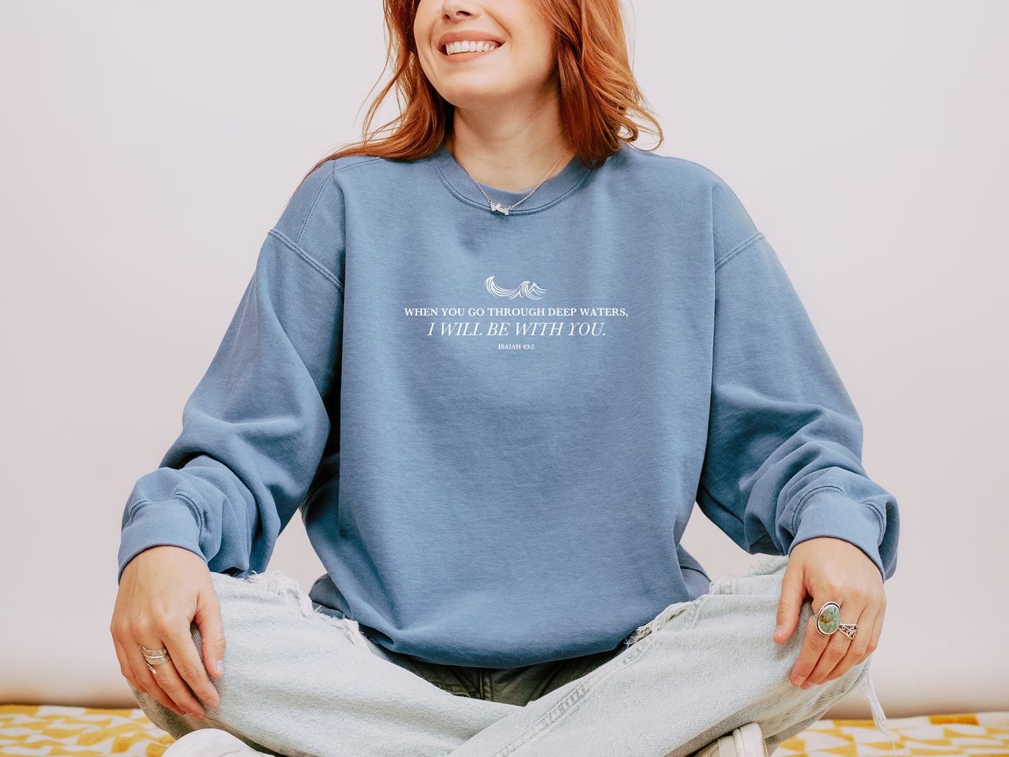 WHEN YOU GO THROUGH DEEP WATERS UNISEX SWEATSHIRT