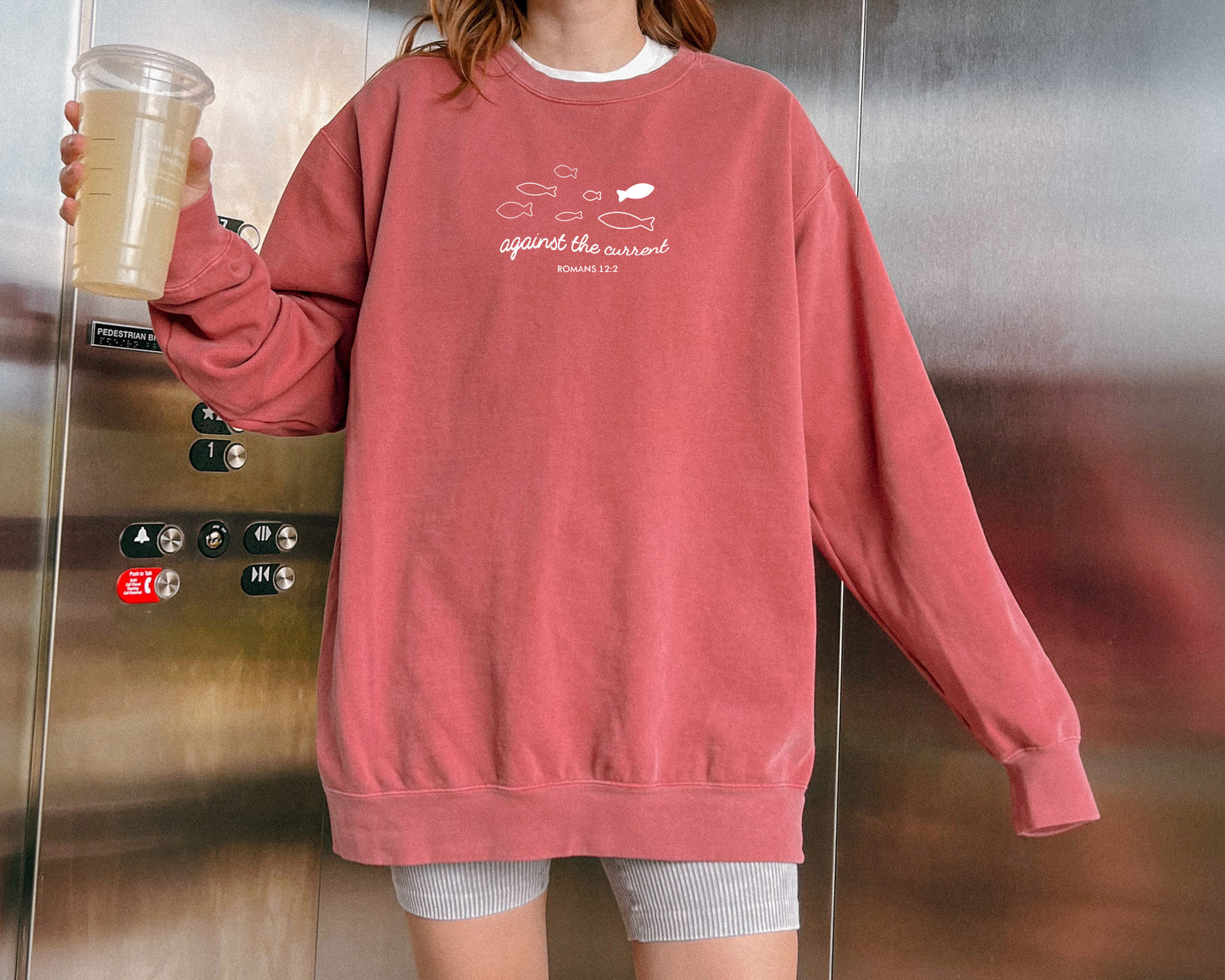 AGAINST THE CURRENT UNISEX SWEATSHIRT
