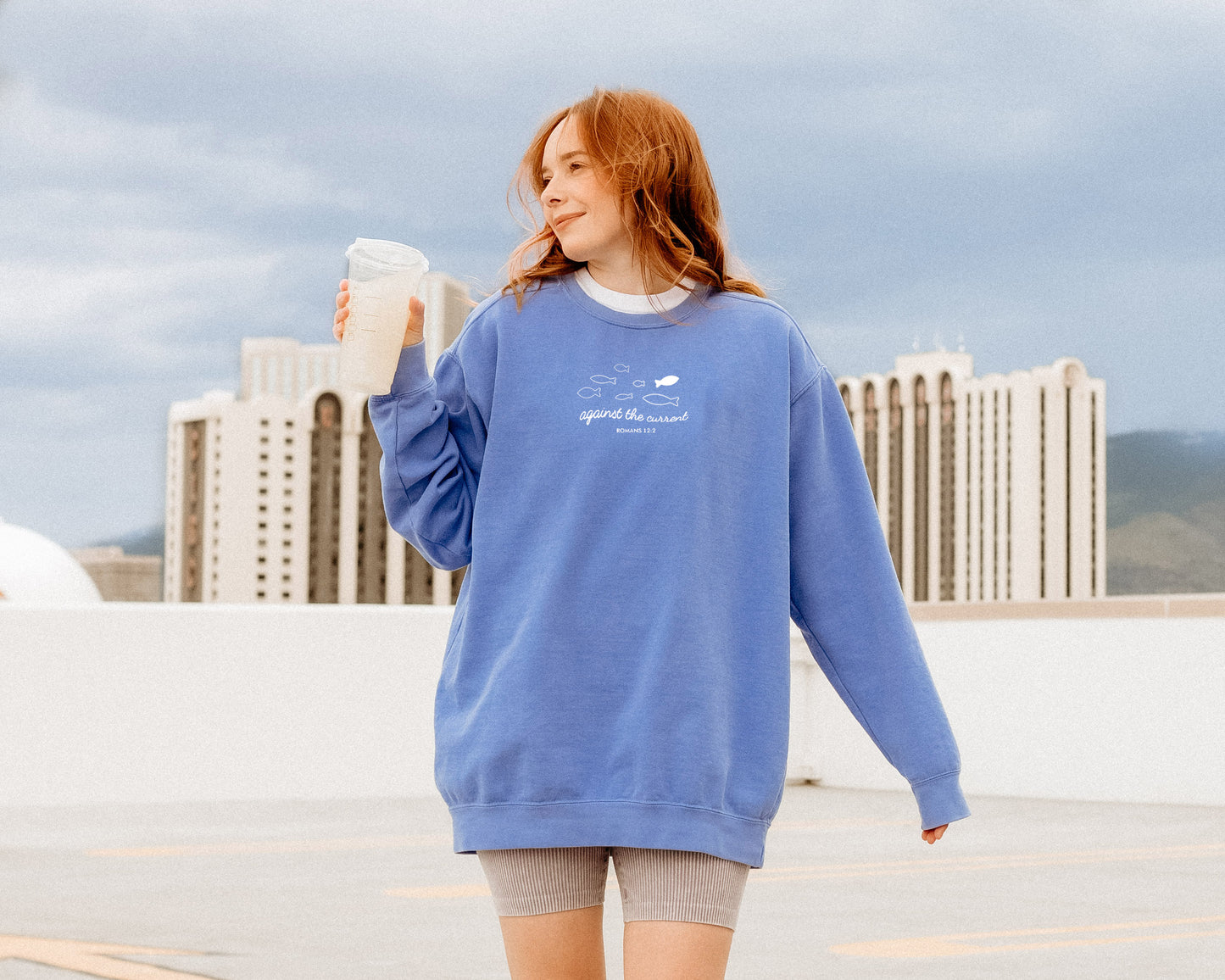 AGAINST THE CURRENT UNISEX SWEATSHIRT
