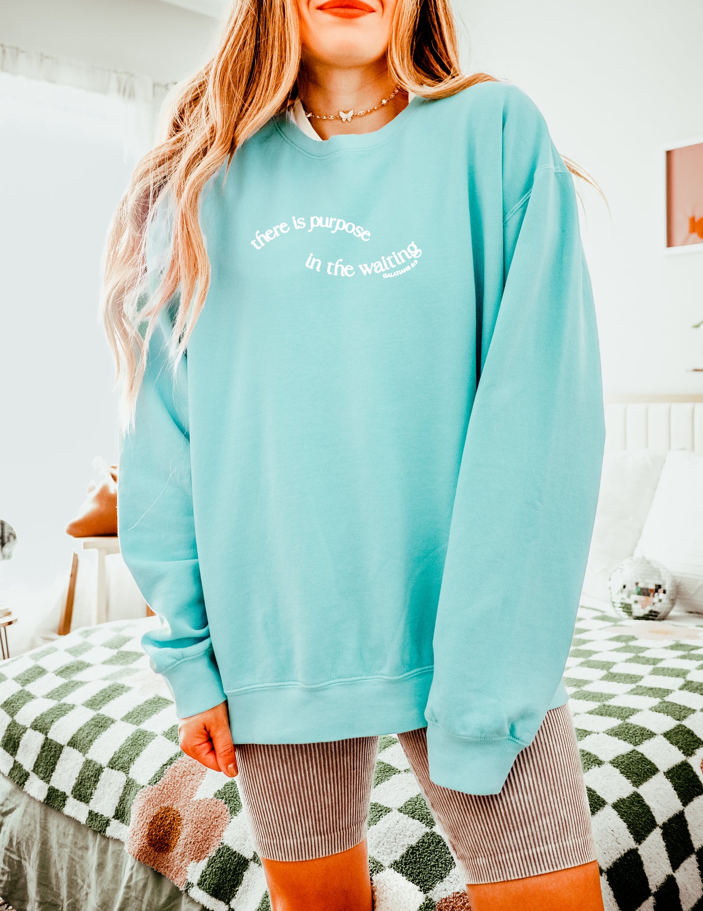 THERE IS PURPOSE IN THE WAITING UNISEX SWEATSHIRT