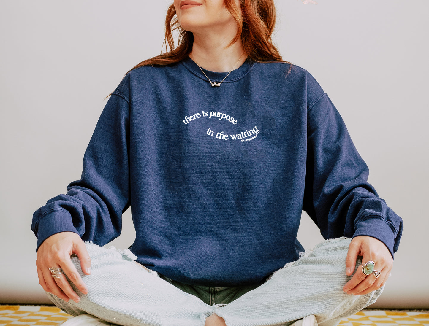 THERE IS PURPOSE IN THE WAITING UNISEX SWEATSHIRT