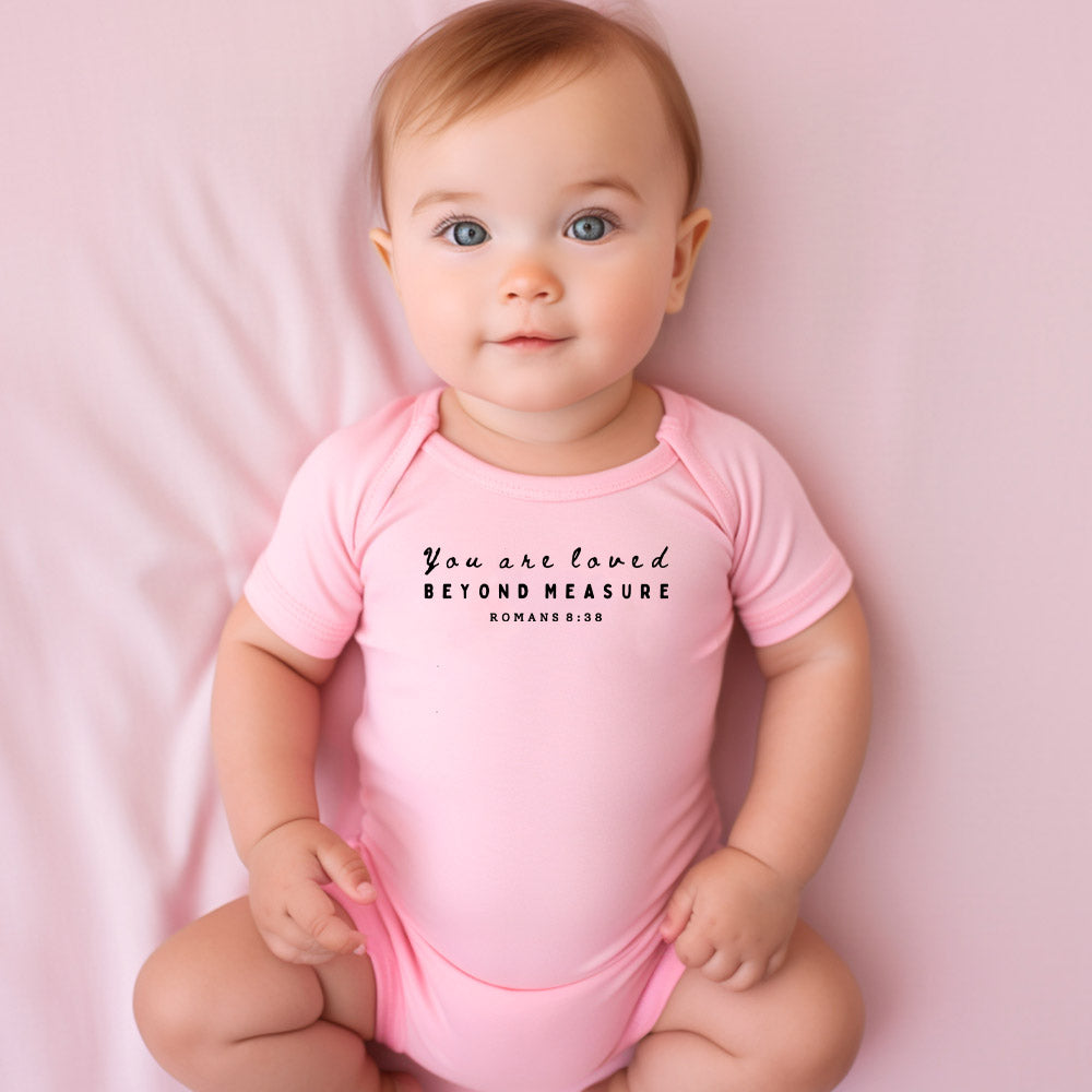 "YOU ARE LOVED BEYOND MEASURE" BODYSUIT IN PINK