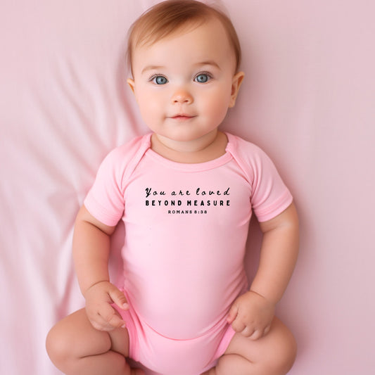 "YOU ARE LOVED BEYOND MEASURE" BODYSUIT IN PINK