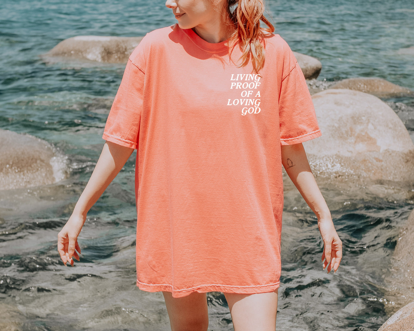 LIVING PROOF OF A LOVING GOD UNISEX TEE