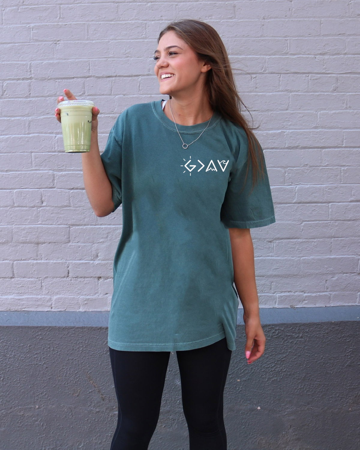 GOD IS GREATER THAN OUR HIGHS AND LOWS UNISEX TEE