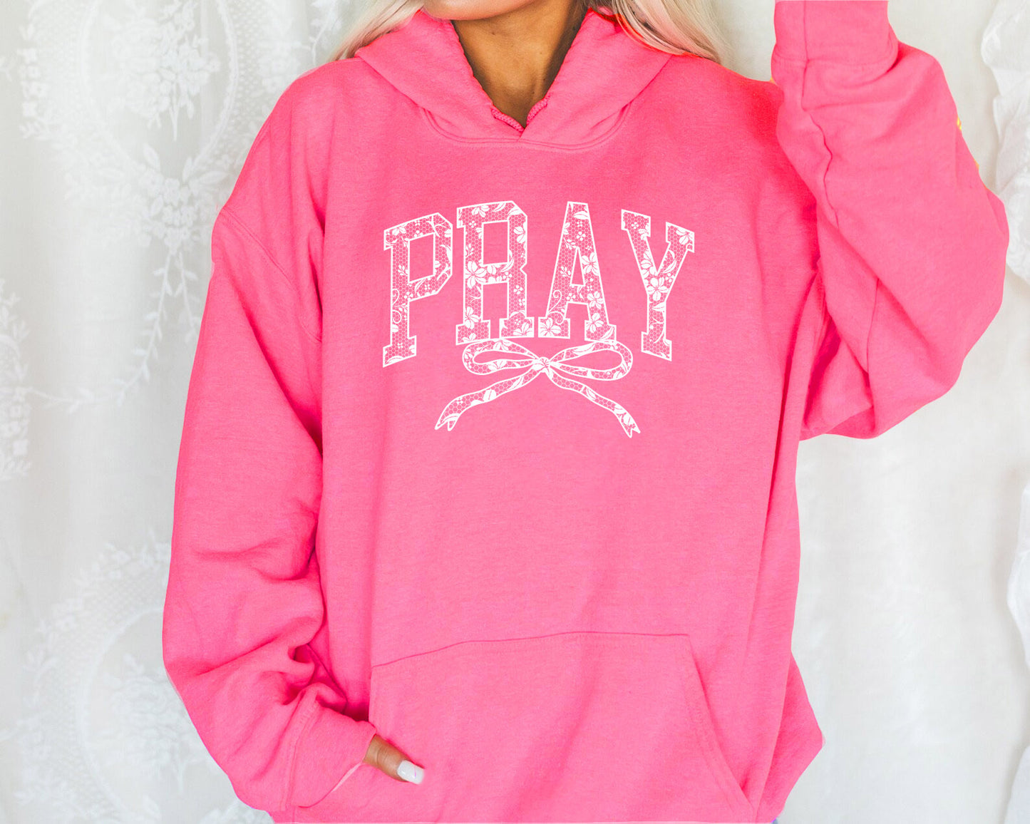 PRAY WITH BOW UNISEX HOODED SWEATSHIRT