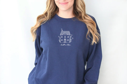 DWELL IN HIM UNISEX SWEATSHIRT