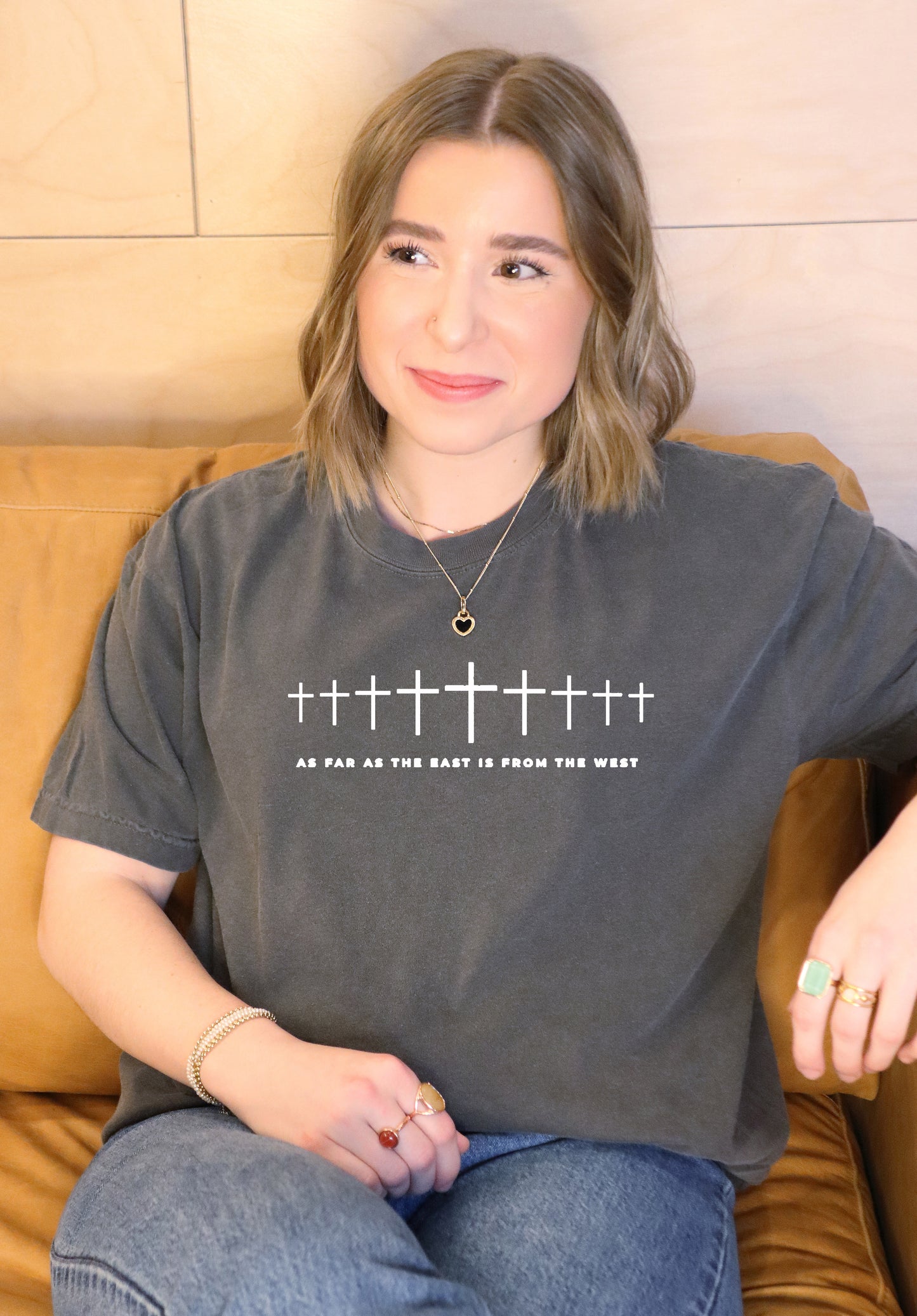 AS FAR AS THE EAST IS FROM THE WEST UNISEX TEE