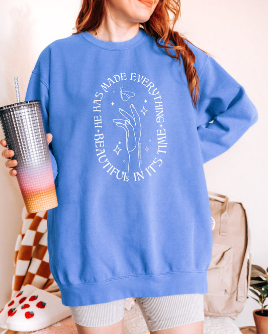 HE HAS MADE ALL THINGS BEAUTIFUL UNISEX SWEATSHIRT - SIZE MEDIUM IN FLO BLUE