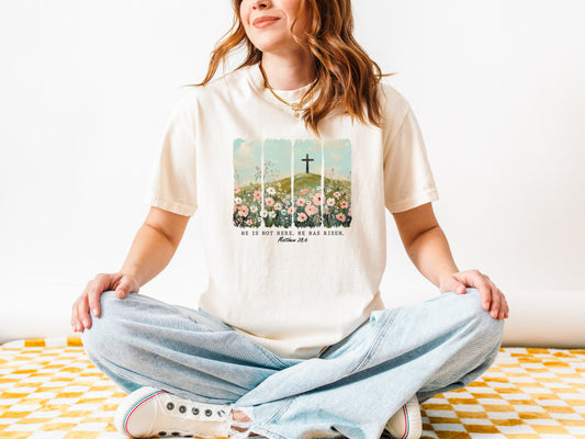 HE IS NOT HERE. HE IS RISEN UNISEX TEE - SIZE MEDIUM IN IVORY