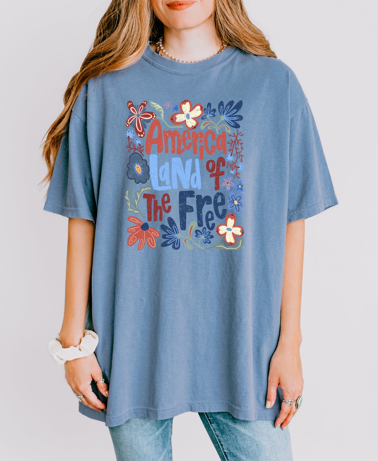 AMERICA LAND OF THE FREE UNISEX TEE