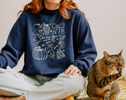 SHE LOVES JESUS AND THE FALL SEASON TOO UNISEX SWEATSHIRT