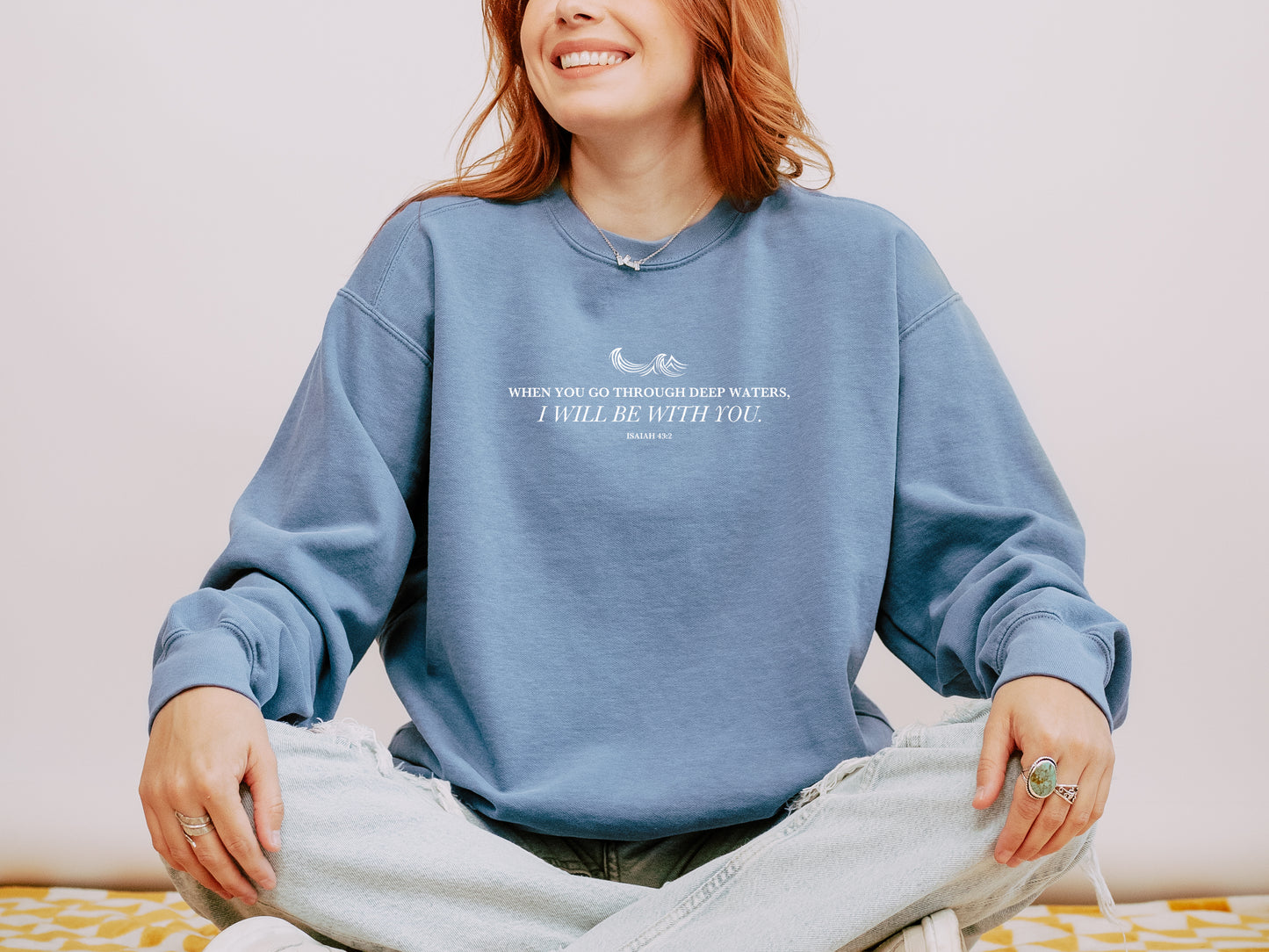 WHEN YOU GO THROUGH DEEP WATERS UNISEX SWEATSHIRT - SIZE LARGE, BLUE JEAN