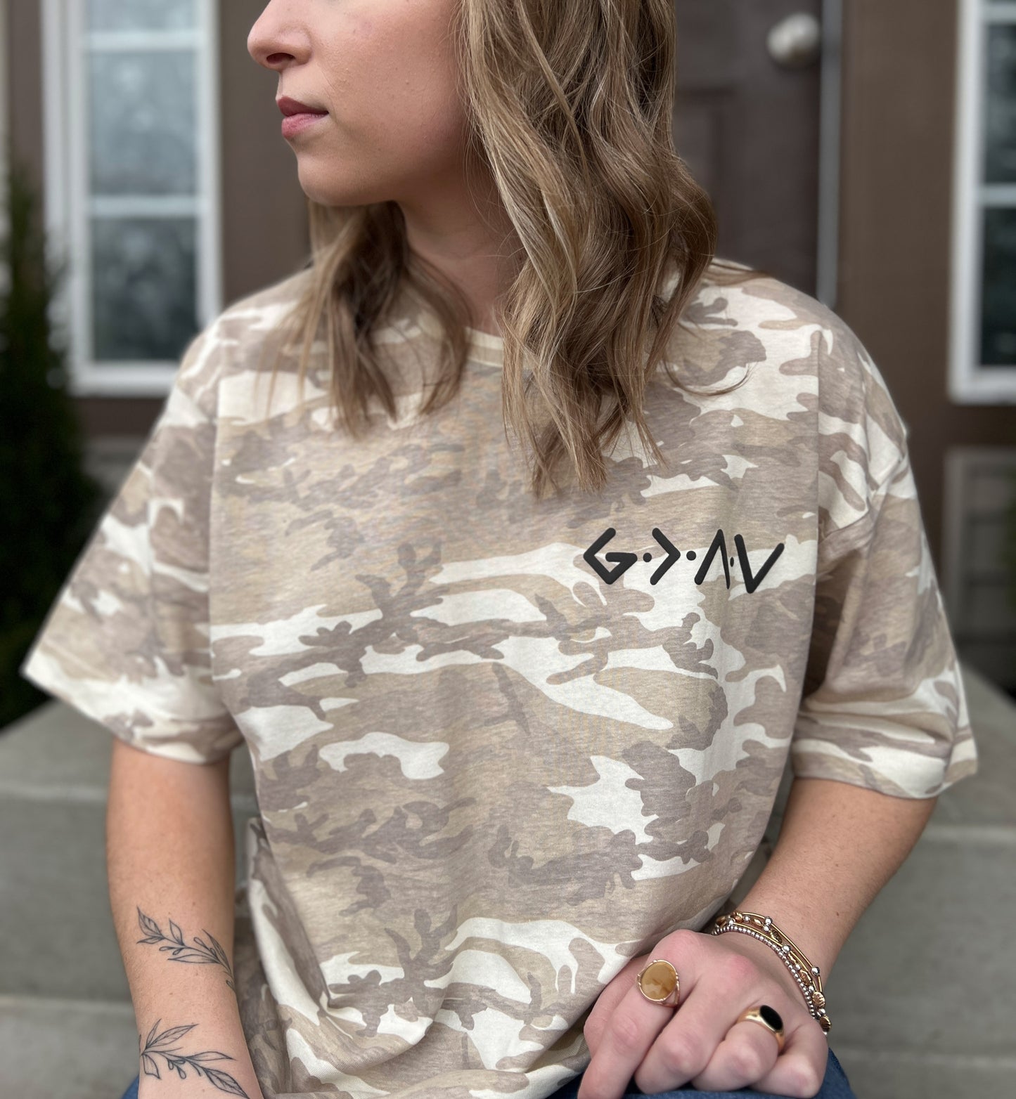 PUFFY GOD IS GREATER THAN OUR HIGHS AND LOWS UNISEX TEE IN NATURAL CAMO