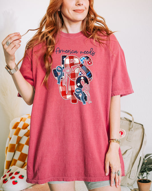 FAUX PATCHWORK AMERICA NEEDS JESUS UNISEX TEE