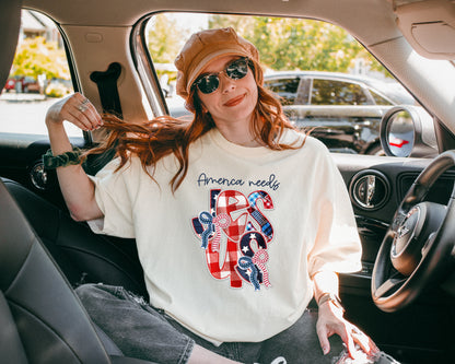 FAUX PATCHWORK AMERICA NEEDS JESUS UNISEX TEE