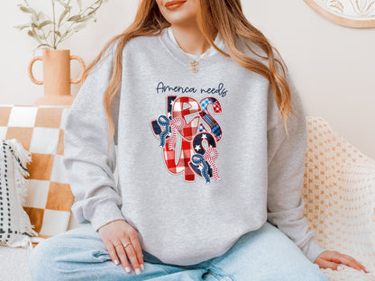 FAUX PATCHWORK AMERICA NEEDS JESUS UNISEX SWEATSHIRT