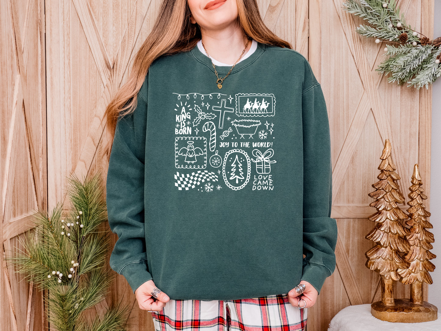 CHRISTMAS: A KING IS BORN COLLAGE UNISEX SWEATSHIRT