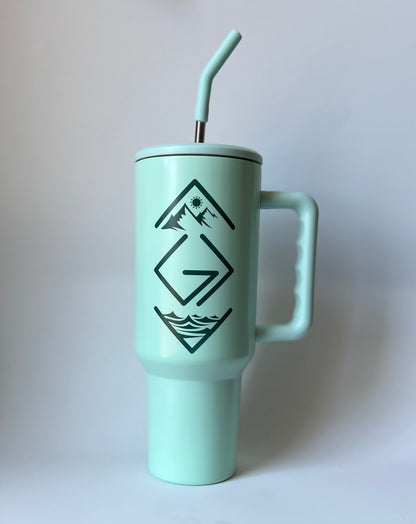 GOD IS GREATER THAN OUR HIGHS AND LOWS 40 OZ. STAINLESS STEEL TUMBLER IN MINT GREEN