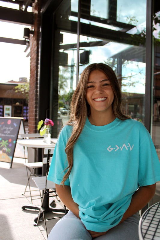 PUFFY GOD IS GREATER THAN OUR HIGHS AND LOWS NEON COLORS UNISEX TEE